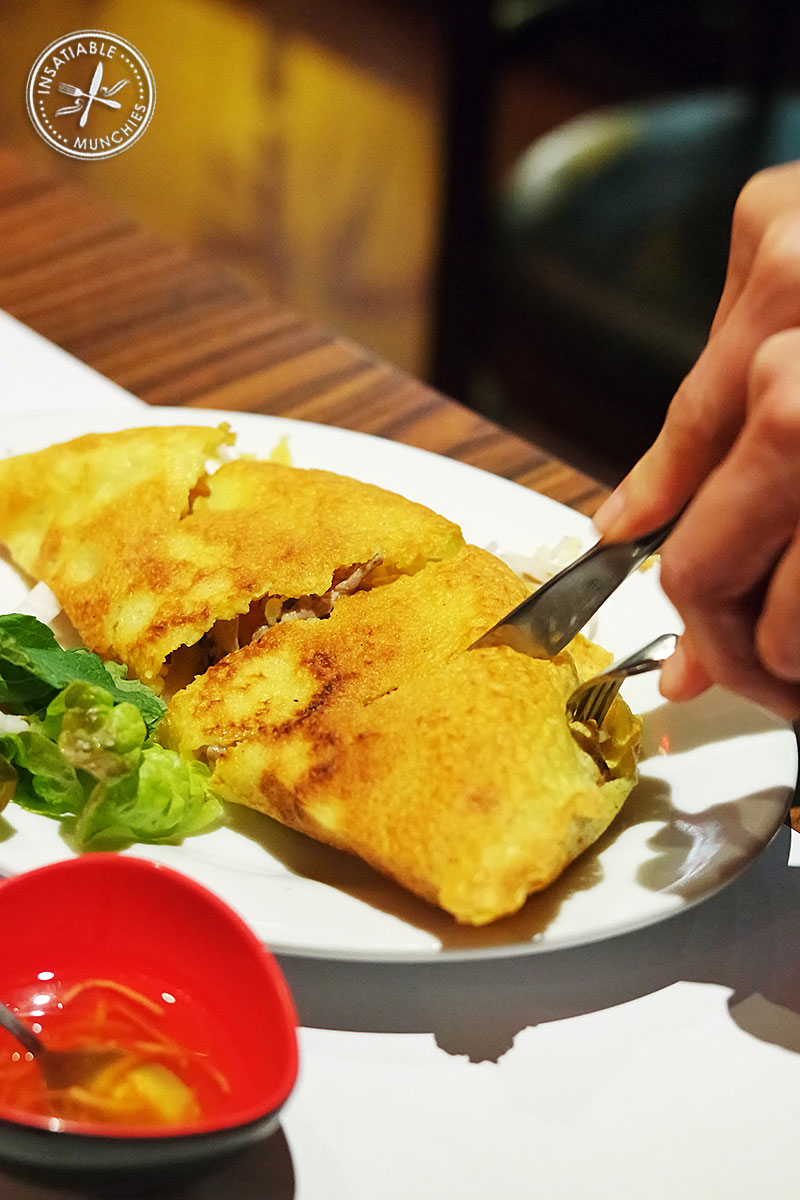 Authentic specialty pancake filled with prawns, pork, bean sprouts and served with salad, pickles and fish sauce. The light and crispy pancake makes this a repeat favourite