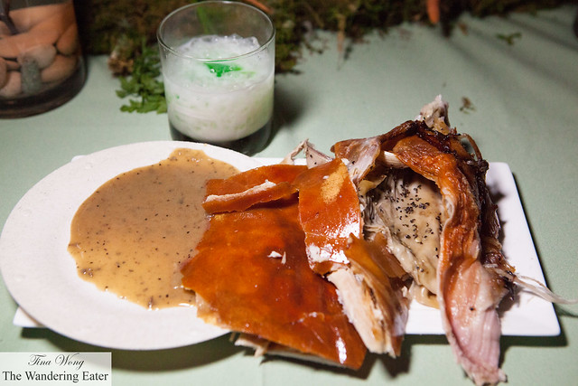 Our plate of lechon with sauce and the milk punch cocktail