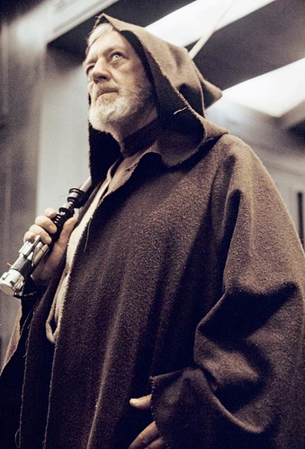 Sir Alec Guinness with a lightsaber