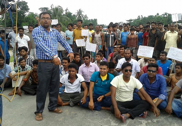 Activists of All Assam Minority Students’ Union (AAMU) stage protest by blocking national highway at Dhaligaon  in Baksa district against the killing of four innocent Muslims by NDFB militants.