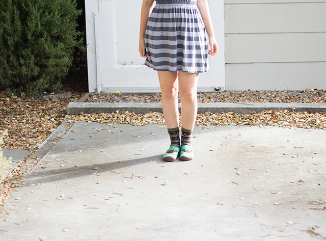 grey striped dress, green shoes