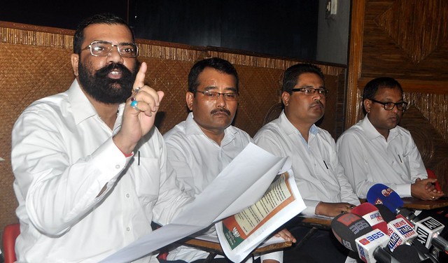 AASU advisor Samujjal Kumar Bhattacharya and other leadership addressing a press conference in Guwahati regarding the central government's decision to resume the construction of the Lower Subansiri Hydroelectric Project. Photo by: Surajit Sharma.