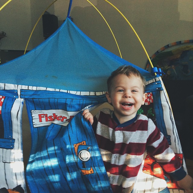 Back home again, in Chicago. Micah seems glad to be out of the car. {#vscocam #vsco #homesweethome #happy #tent #toddler #son #vscofam #smile #cute}