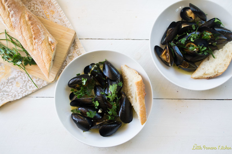 Julia Child's classic recipe for mussels mariniere couldn't be any easier. Steamed in minutes with shallots, garlic, white wine and fresh herbs. 