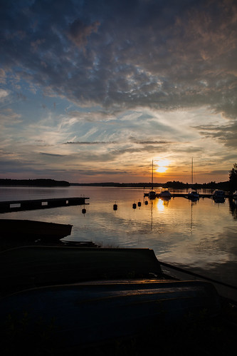 sunset sky sun lake reflection water finland river landscape boot boat landschap