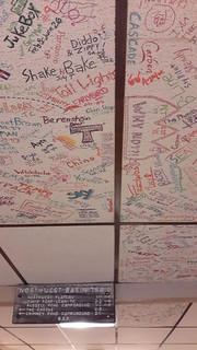 The ceiling in the Appalachian Trail Cafe with prior years signed ceiling tiles