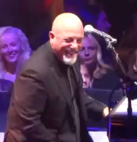 Billy Joel smiles