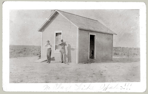 RPPC Two men and a shed or maybe the house.