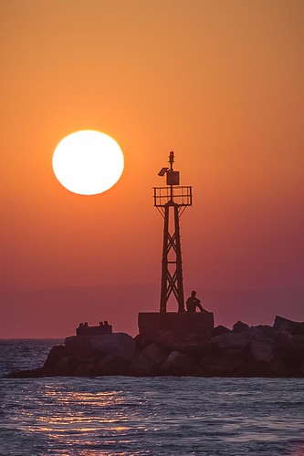 sunset sea lighthouse aegean greece syros kini