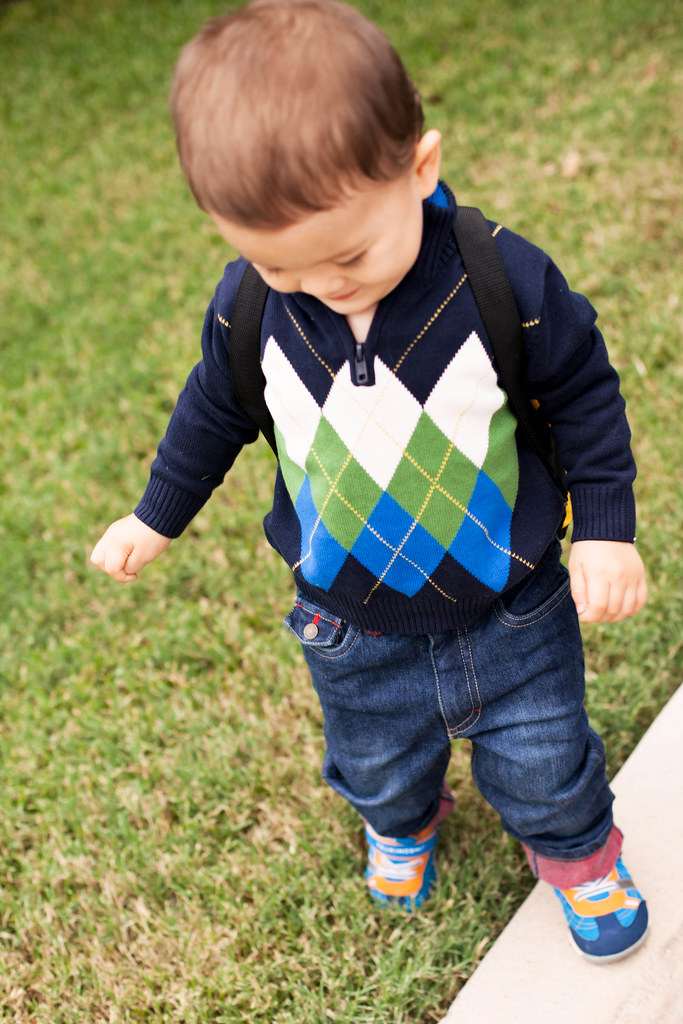 cute & little blog | toddler boy fashion | hartstrings argyle sweater, dark rolled jeans, backpack | fall back to school BTS
