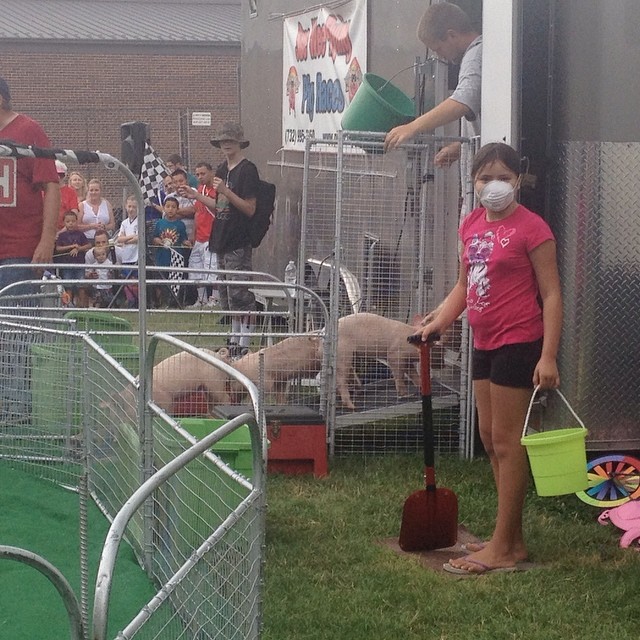 Maya was chosen to be the track official and safety coordinator for the pig races at Arlington County Fair. So fun!