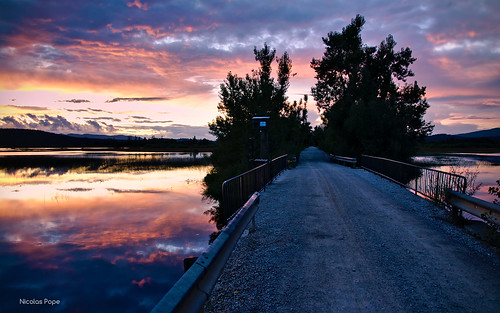 bridge sunset lake slovenia cerknica