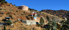 Giant artwork and water tank - hillside residential suburb, Bisbee, Arizona