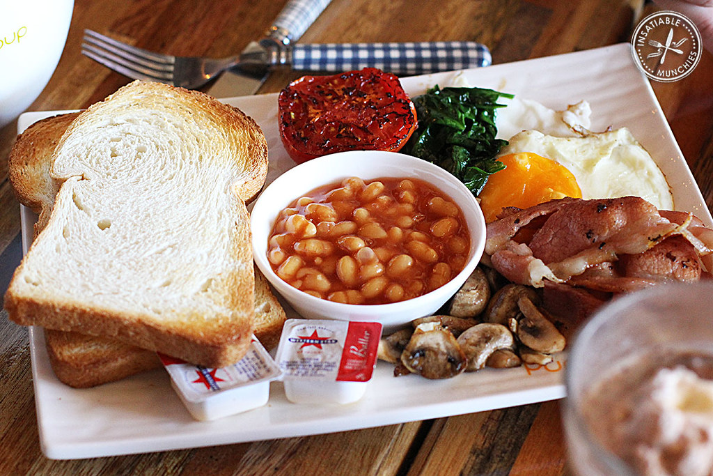 The Big Breakfast from Sweet Pumpkin Soup in Eastwood comes with baked beans, mushrooms, bacon, eggs, wilted spinach, grilled tomato half and thick slices of white toast.