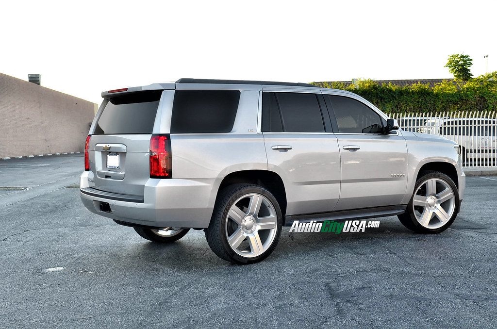 2015 Chevy Tahoe on 24" Texas Edition wheels in silver. 