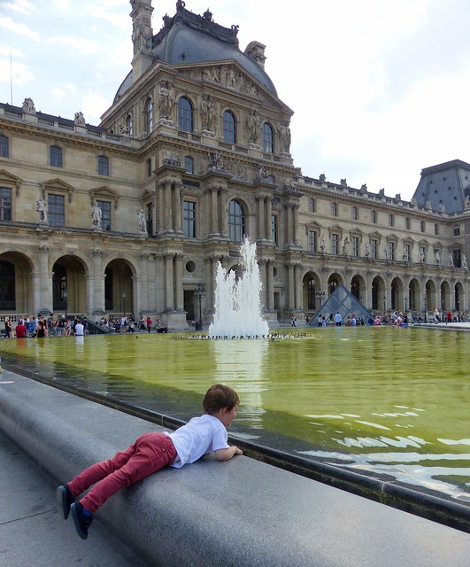 Fountains are for splashing on a hot day. Even at the Louvre.