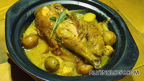 Golden Chicken - half spring chicken roasted with garlic and served with buttered sautéed potatoes (S$23)