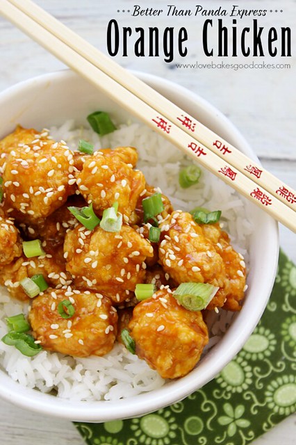 Orange Chicken (Better Than Panda Express) in a bowl of white rice with chopsticks.