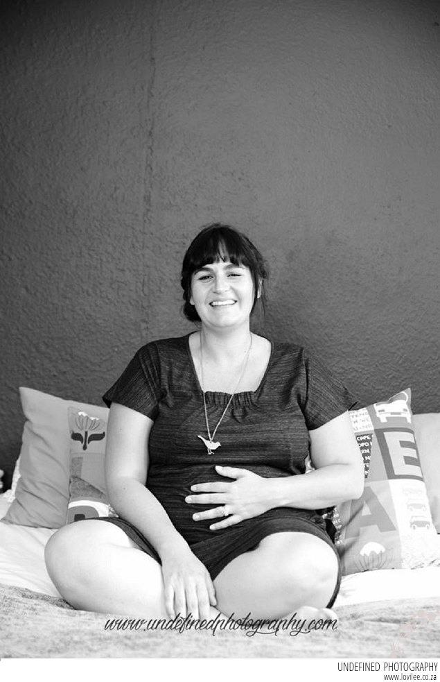 Maternity shoot with monocrome nursery