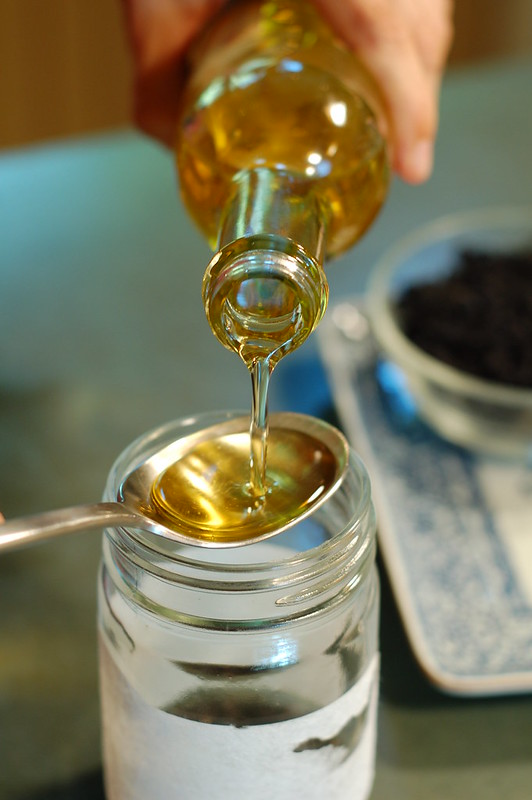 Adding the toasted sesame oil by Eve Fox, The Garden of Eating, copyright 2014