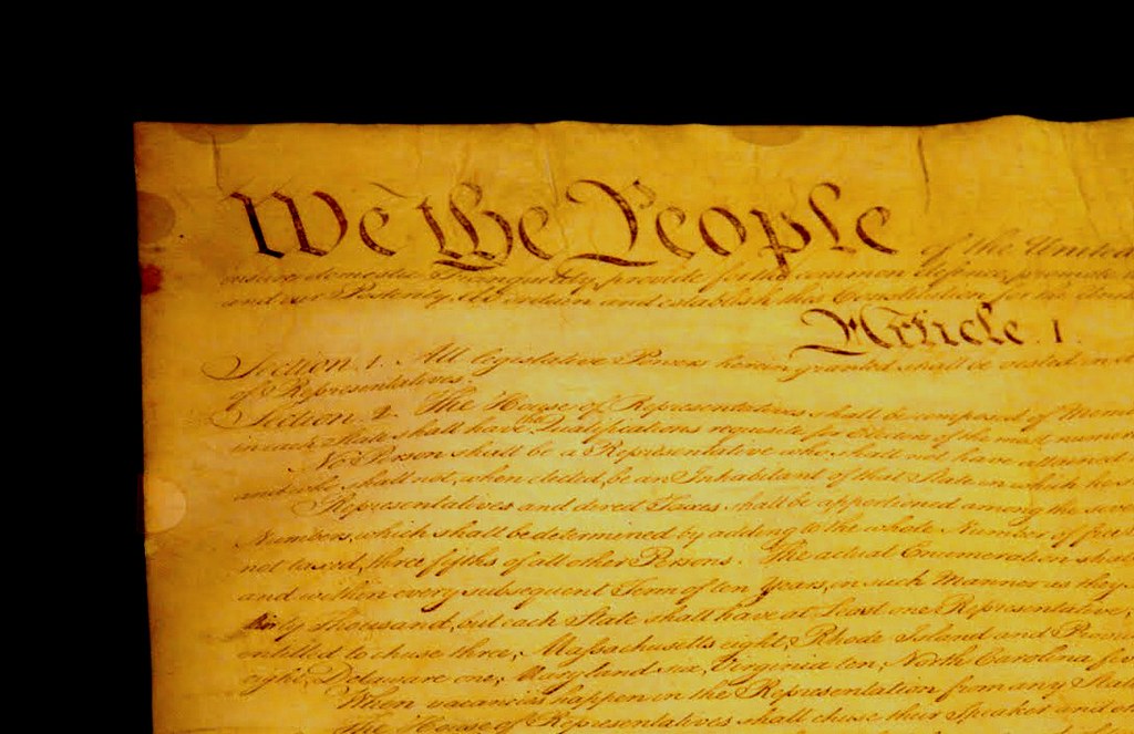 Fragment of the United States Constitution, including the words "We the People"