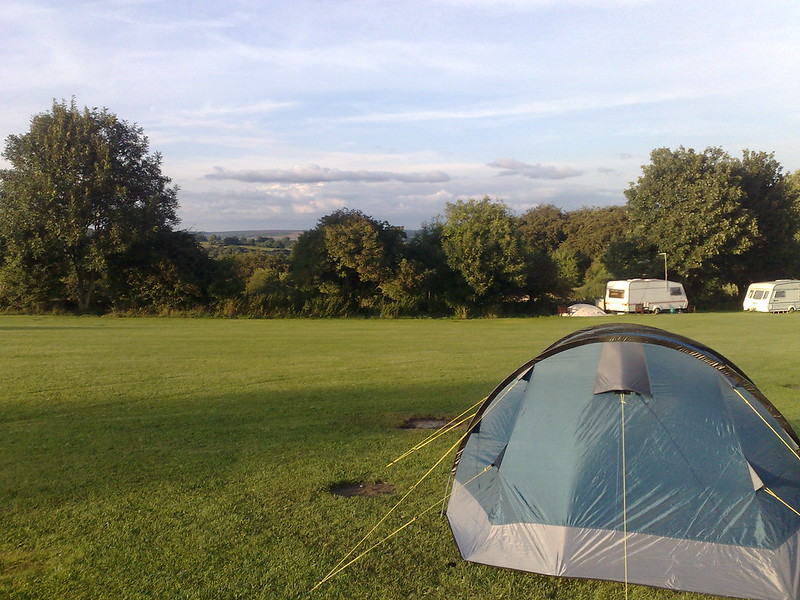 Tent pitched, with a view over the surrounding countryside