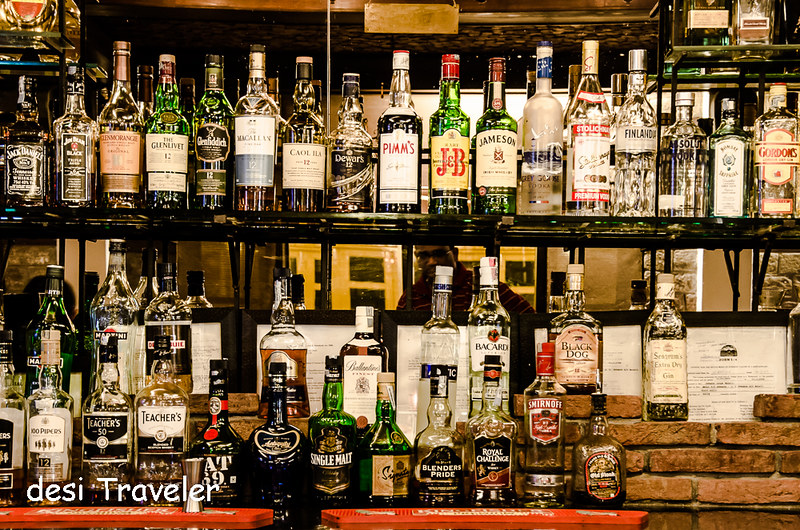 liquor bottle in bar Johnson Lodge Manali