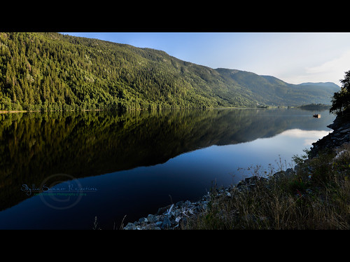 blue summer mountain lake water reflections mirror boat fishing deep hillside d800 nikon1635f4g