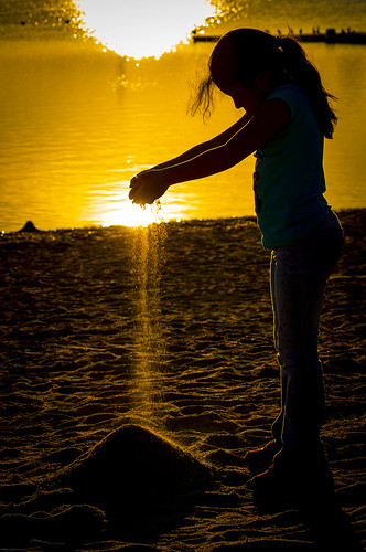 sunset castle beach girl boston island sand pile