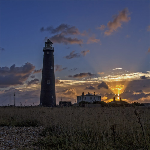 lighthouse clouds sunrise dawn kent elements dungeness rays