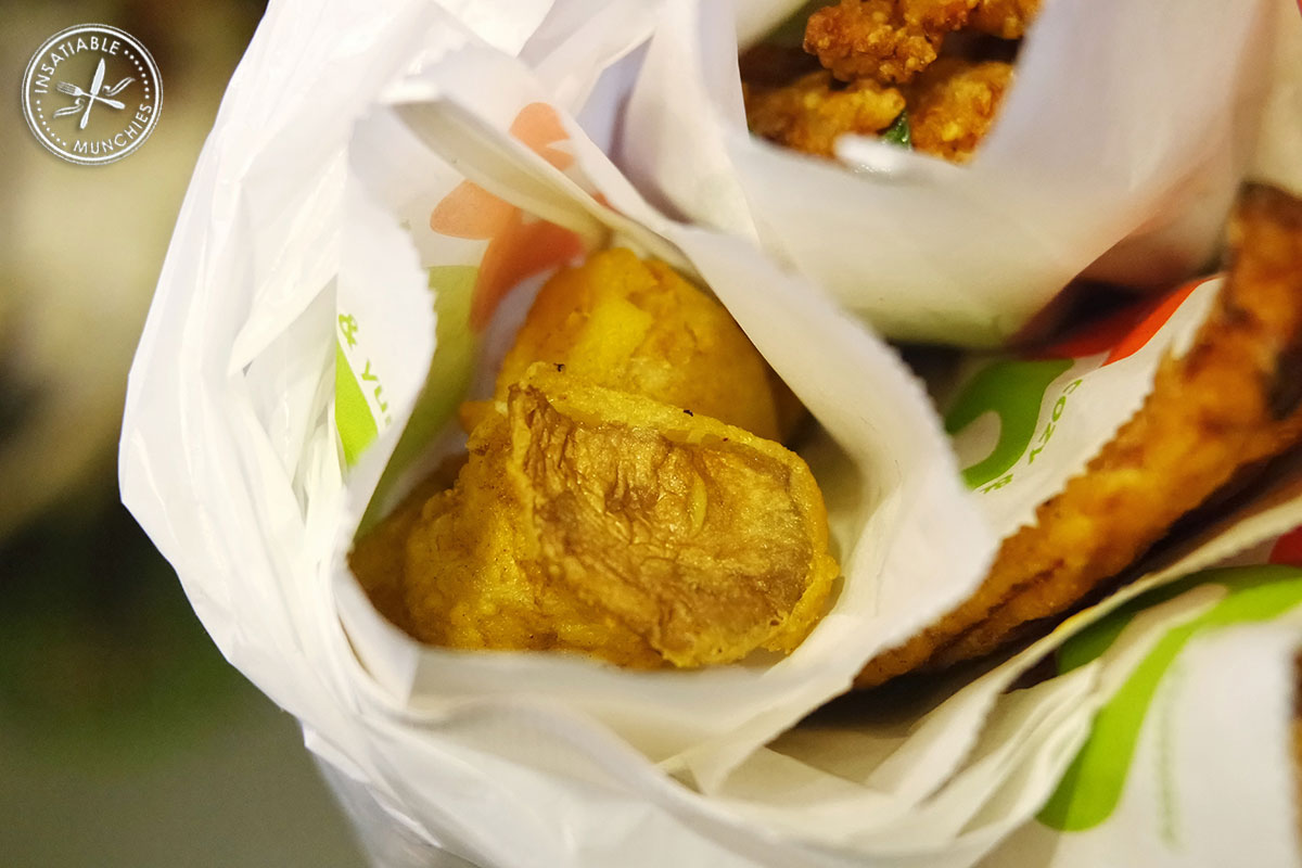 Deep fried king mushrooms, served in a paper bag