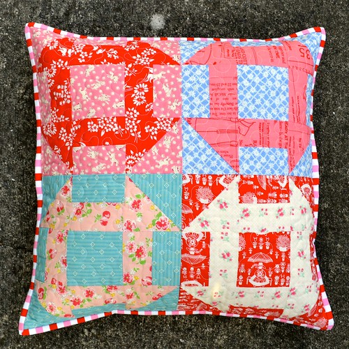 Pink, red and blue cushion