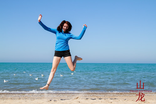 woman ontario beach pose jump women grandbend