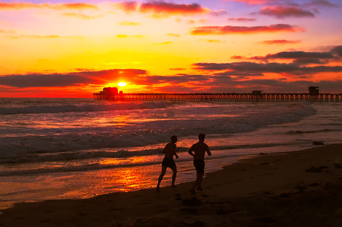 ocean california sunset red seascape beach pier sand surf waves pacific southern oceanside runners joggers