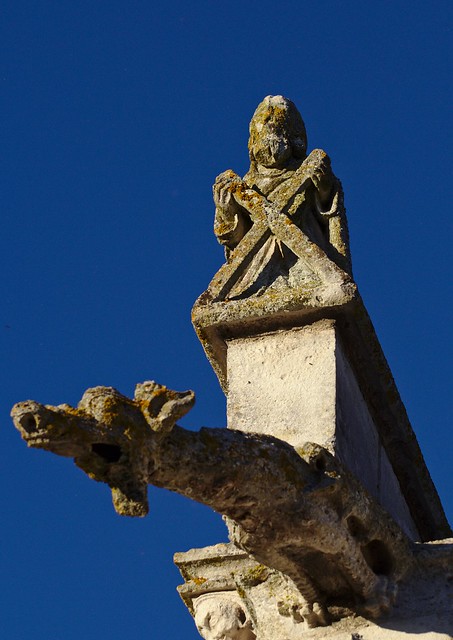 Saint Andrew holding a cross
