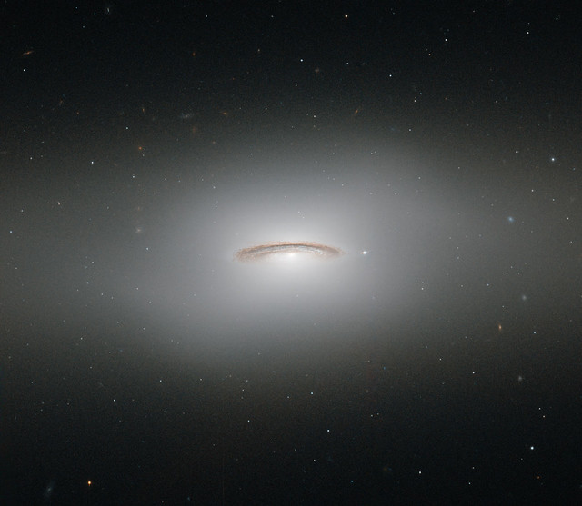 Hubble Views the Whirling Disk of NGC 4526