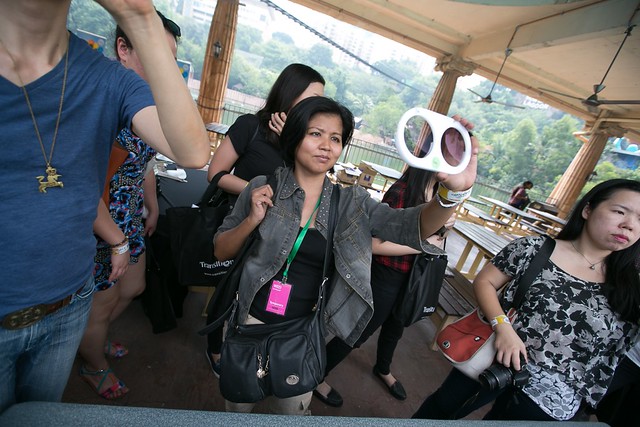 A member of the audience testing out Transitions Signature lenses display units