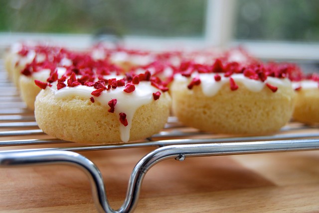 Mini Baked Vanilla Doughnuts with Limoncello Glaze & Freeze Dried Raspberries