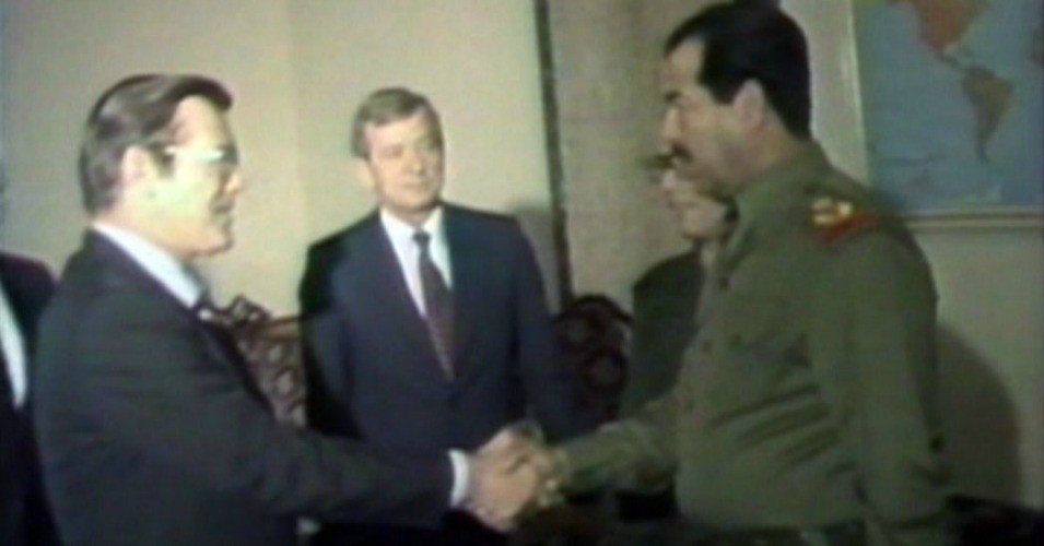 Donald Rumsfeld Greets Saddam Hussein