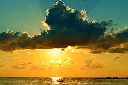 blue beach yellow sunrise golden cloudy