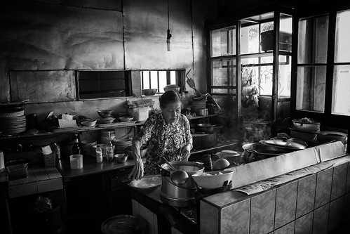 bw woman cooking sumatra indonesia restaurant warung tarutung