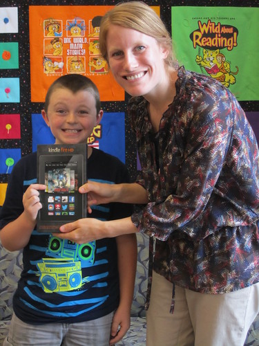 The Kindle Fire winner from the Urbana Library receives his prize. 