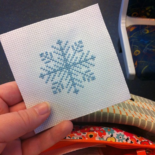 Just finished the little snowflake design that I've been stitching during my morning commute lately :)