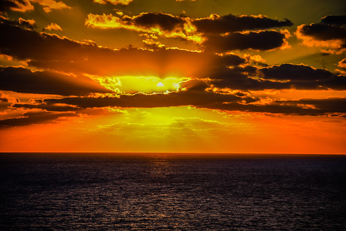 cancún quintanaroo mexico mx caribbean sea sunrise cancun water ocean gulf cove resort hotel vacation morning am dawn clouds yellow orange yucatán yucatan quintana roo riviera maya rivieramaya