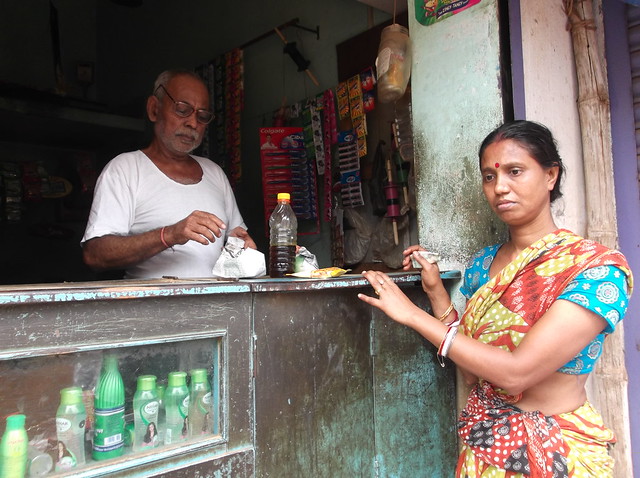 Local grocery shopkeeper Mahadev Sahu and Shamoli Das at Khakhragarh, Burdwan.