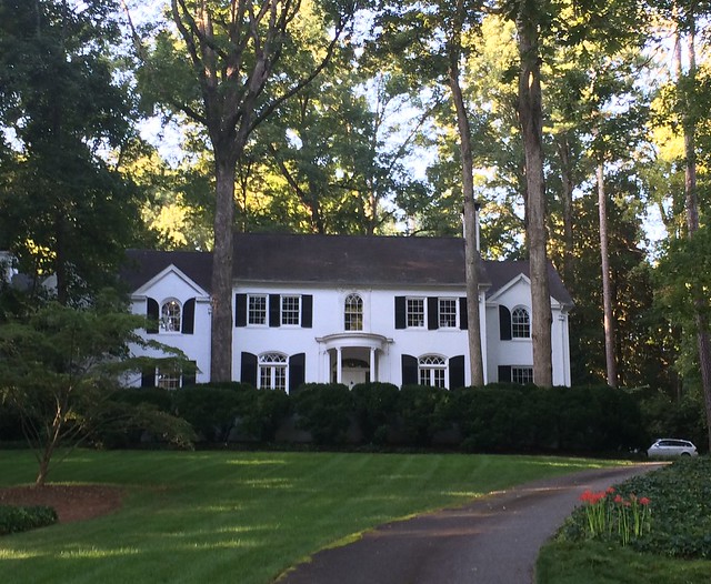 white house black windows black shutters