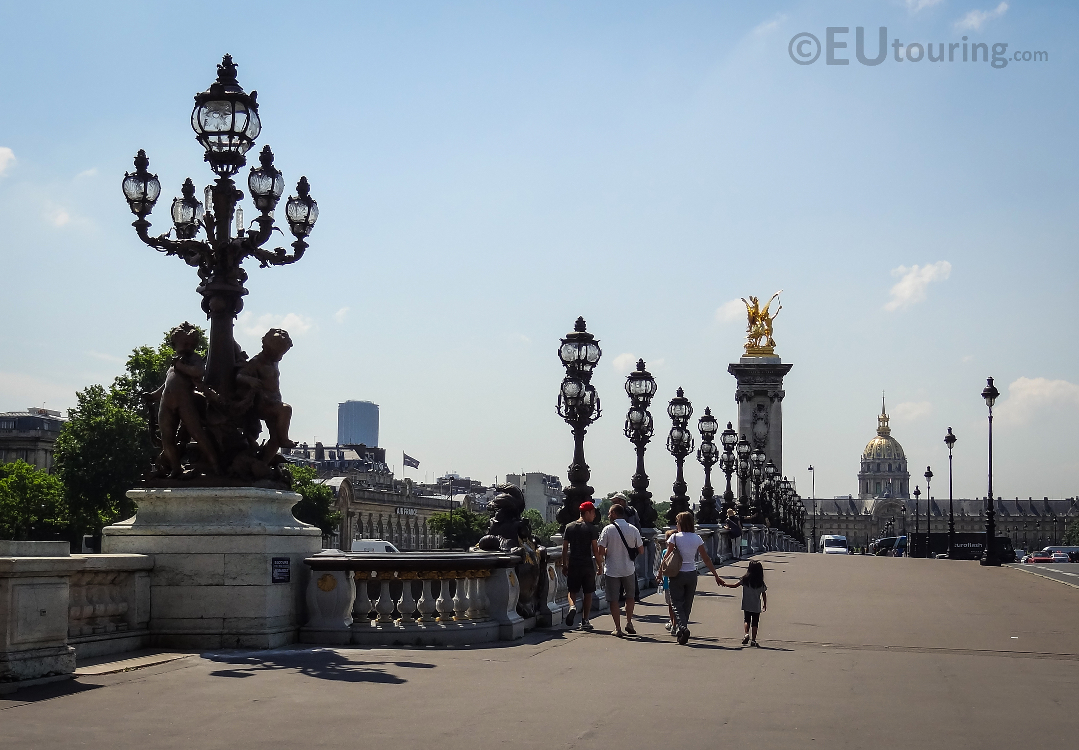 Lamp posts down the Pont Alexandre III