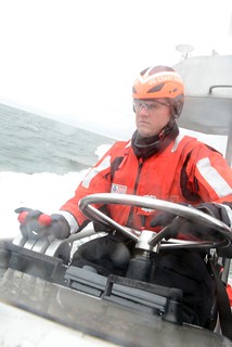 Petty Officer 2nd Class Chris Henry, a coxswain at Coast Guard Station Manasquan Inlet, N.J., drives a 47-foot Motor Life Boat offshore from Manasquan Thursday, Oct. 23, 2014. The station’s crew regularly trains for their primary missions, which include search and rescue, law enforcement and recreational boating safety. (U.S. Coast Guard photo by Petty Officer 2nd Class Cynthia Oldham)