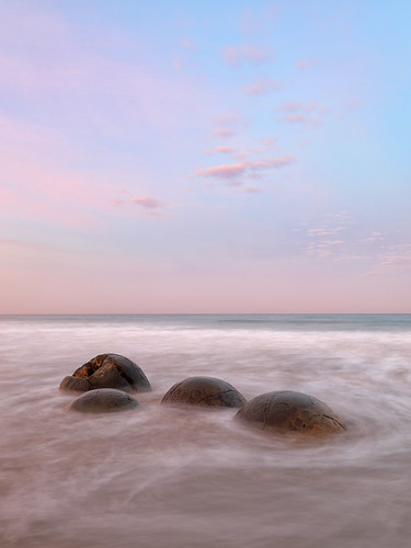 moeraki boulders new zealand east coast south island sunset long exposure ocean pink blue pacific